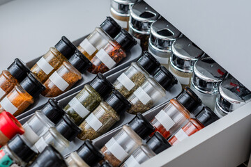 Organized Spice Rack in a Kitchen Drawer