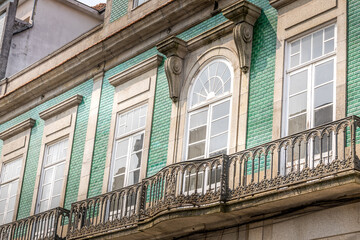 Typical Portuguese balcony in the Santa Catarina avenue, Porto, Portugal