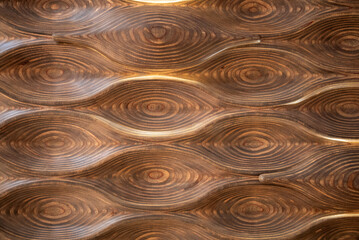 Carved brown wooden wave texture background