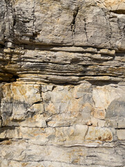 Rock wall with sediment layers