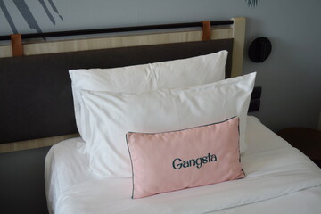 Three Pillows on a Bed in Jonox Hotel Room, Phuket, Thailand