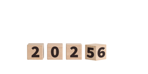 Wooden blocks with "2025-2026" text on a white background enhance New Year celebrations. Their wooden texture brings a cozy feel to holiday decorations.