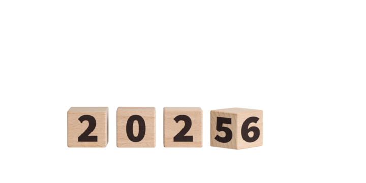 Wooden blocks with "2025-2026" text on a white background enhance New Year celebrations. Their wooden texture brings a cozy feel to holiday decorations.