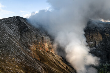 Smokes sits on a volcanic crater rim