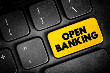 Open Banking - financial technology that enable third-party developers to build applications and services around the financial institution, text concept button on keyboard