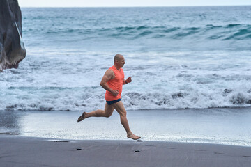 Man running on the beach