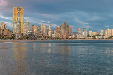 Fototapeta premium Sunset view of modern buildings in front of Poniente Beach in Benidorm, Spain