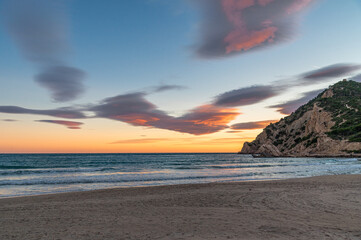 View of the beach of Cala de Finestrat at sunset, Spain
