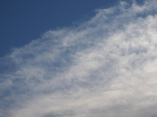 clouds over blue sky background