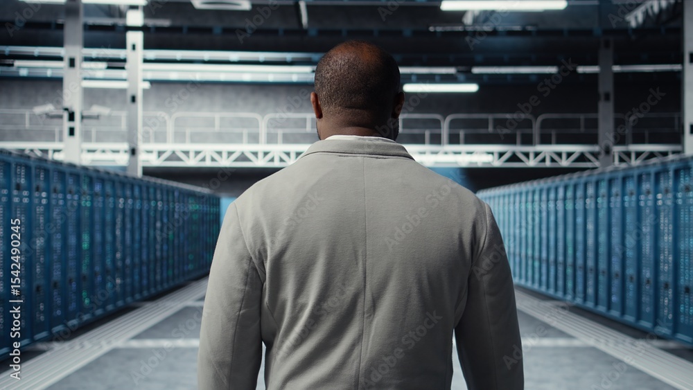 Poster system administrator in data center doing inspection on infrastructure tech handling user requests. 