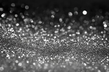 Fototapeta premium Abstract black and white or silver glittery texture for a festive background