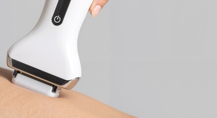 Hand pressing white laser hair removal device skin treatment. Modern beauty technology skincare procedure. Cosmetic dermatology wellness concept