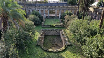 Pompeii, Italy – 8 January 2025. At Diomede's Villa in Pompeii, a large overgrown garden features...