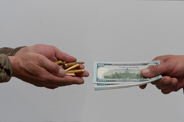 The exchange of ammunition for money. Concept of illegal arms trade, criminality, corruption in the army.