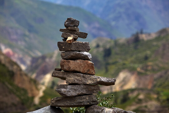 Steps of gratitude and connection.These apachetas, stone cairns built by trekkers, honor the Pachamama (Mother Earth). Each stone represents a moment, a wish, or a blessing left behind on the journey 