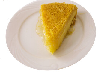 A greek pastry called milk cake in a white plate
