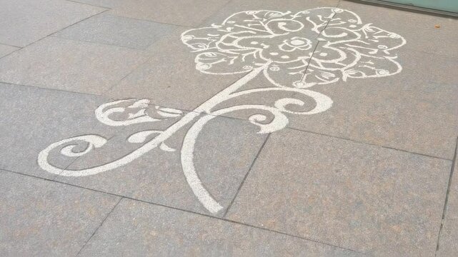 Floral pattern in stone paving stones