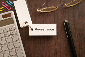 There is word card with the word Governance. It is as an eye-catching image.