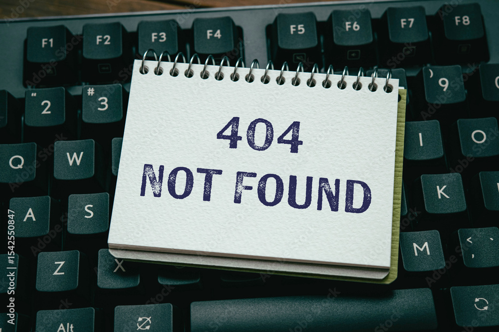 Fototapete there is notebook with the word 404 not found. it is as an eye-catching image.
