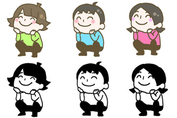 笑顔でしゃがみ頬杖をついている子ども