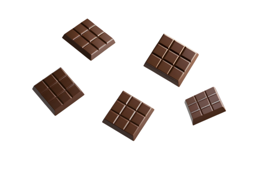 Minimalist composition of several milk chocolate squares floating on a light grey background