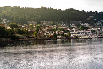 Drøbak, a charming town in Akershus County, welcomes tourists with its picturesque marina and sunny hillside views, perfect for day trips and sailing adventures.
