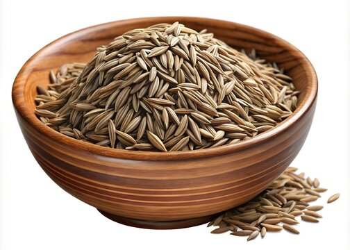 A wooden bowl overflowing with whole cumin seeds a popular spice