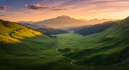 Fototapeta premium Lush Green Valley at Sunrise Panoramic View Scenic Mountain Landscape with Golden Hour Light and Serene Atmosphere