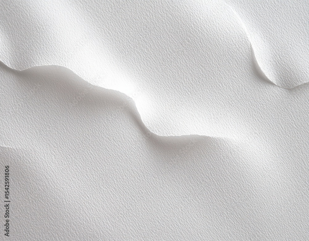 Poster close-up of white textured paper with torn edges creating soft shadows and gentle curved shapes on a