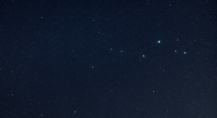 Fototapeta premium Night Sky with Scattered Stars and Constellations