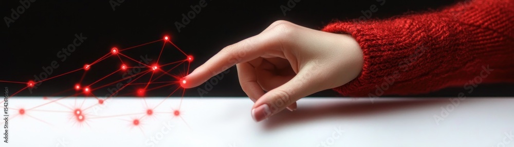 Poster hand with red sweater sleeve reaching out to touch glowing red digital network nodes on dark backgro