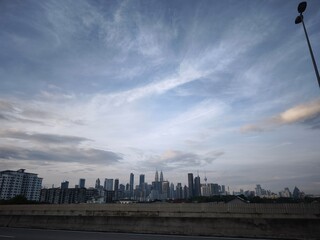 Stunning Kuala Lumpur City Skyline at Dusk Featuring Iconic Urban Landscape in Malaysia