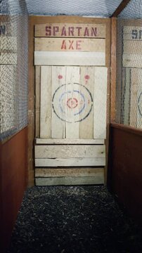 Opening Fence Gate to Axe Throwing Lane with Large Wooden Target