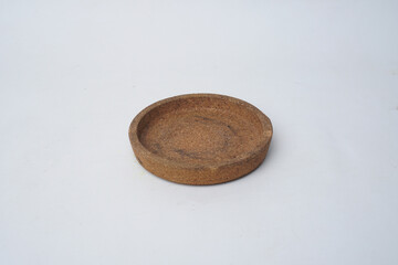 Round coaster made of compressed wood dust