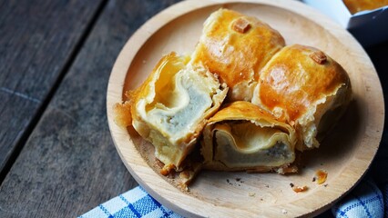 Banana bolen is made from banana and pastry skin and has chocolate and cheese filling. Banana bolen is Banana Wrapped with Puff Pastry