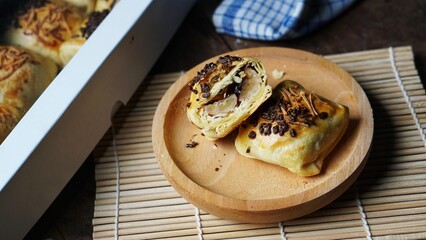 Banana bolen is made from banana and pastry skin and has chocolate and cheese filling. Banana bolen is Banana Wrapped with Puff Pastry