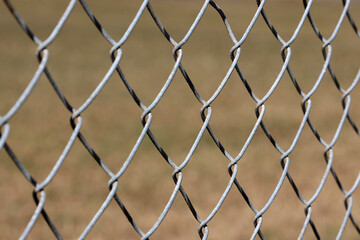Close-up of a metal chain link fence abstract background
