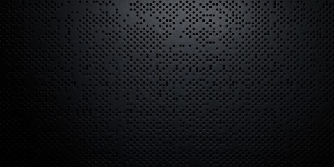 Close-up view of a black perforated surface with numerous small round holes creating a textured, industrial pattern