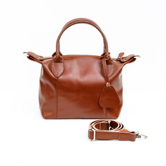 Beautiful shiny brown leather bag isolated on white background, Perfect for leather products...
