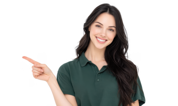 A cheerful young woman in a green polo shirt smiles while pointing to the right. set against a plain white background. ideal for promotional materials or social media content
