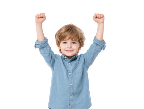 A cheerful young boy celebrating with raised arms against a plain white background. expressing joy and victory. perfect for conveying happiness and success in family or children's themes