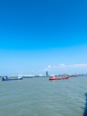ship on the sea under blue sky