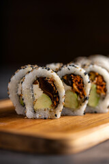 Traditional Japanese sushi on serving board