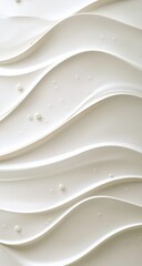Obraz premium Close-up of a white cake with wavy, textured frosting and scattered pearls