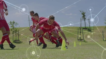 soccer drill capturing players sprinting on whistle navigating agility cones with tracking overlay - Powered by Adobe
