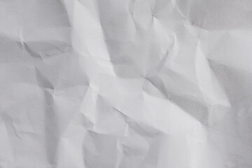 The texture of the bright white drawing paper is wrinkled, white paper texture.