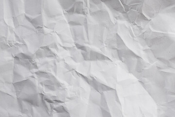 The texture of the bright white drawing paper is wrinkled, white paper texture.