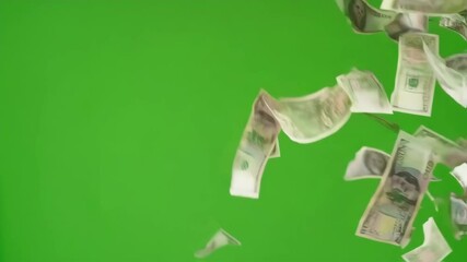 Slow motion falling banknotes drifting gently from above, isolated on green screen background, high detail, realistic lighting, crisp shadows, seamless chroma key backdrop - Powered by Adobe