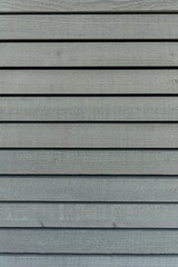 Rustic wooden fence surface with textured horizontal planks