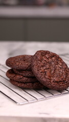 Fudgy Brownie Cookies combine the rich, chewy center of a brownie with the crisp edges of a cookie. With glossy, crackly tops and deep chocolate flavor, these cookies offer melt-in-your-mouth indulgen